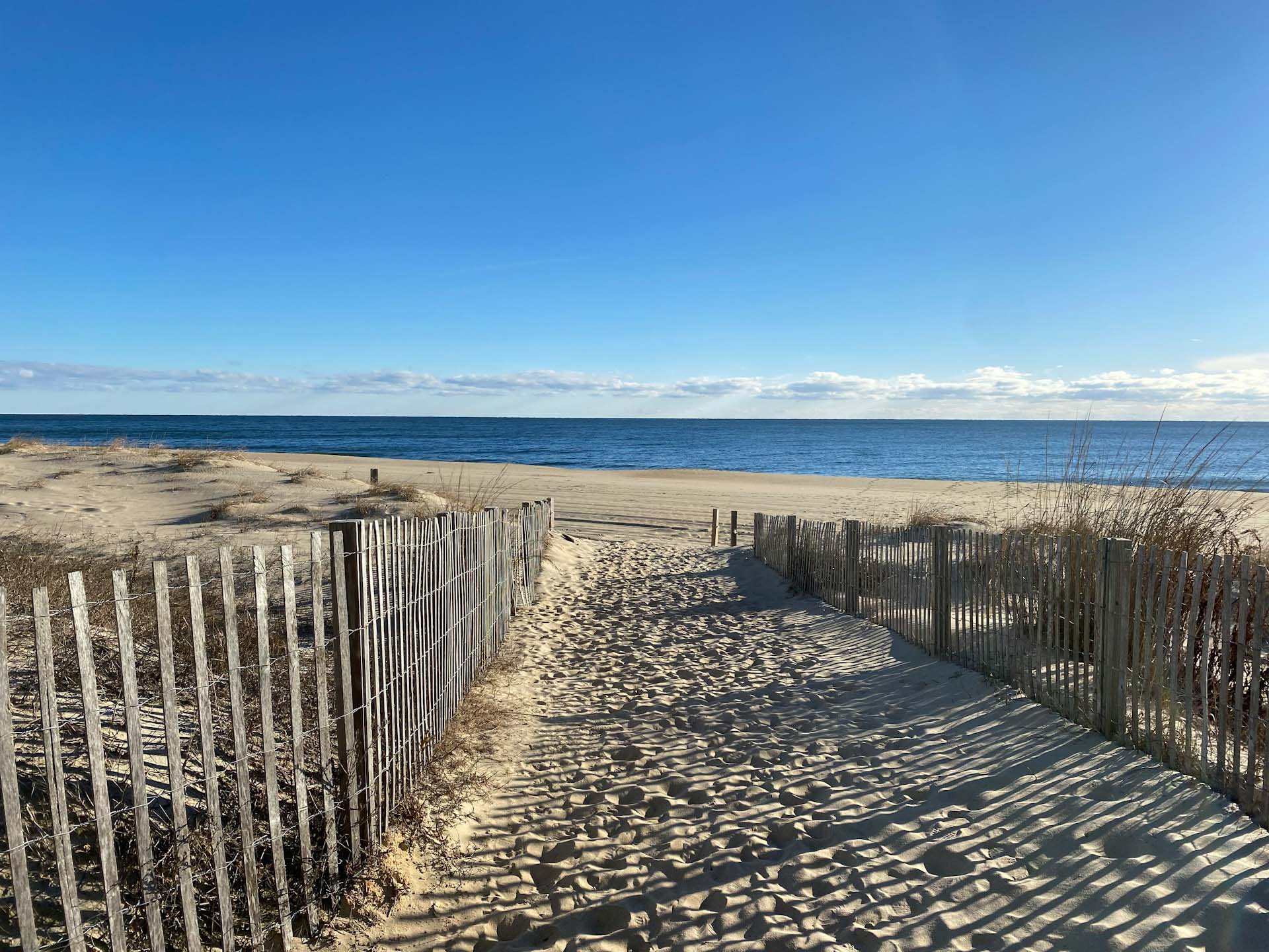 Looking out to a sandy beach in Ocean City, Maryland